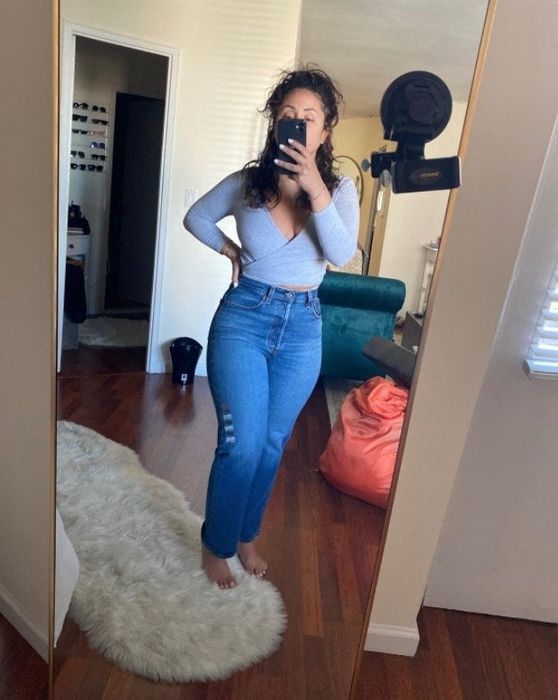 a reviewer showcasing the jeans