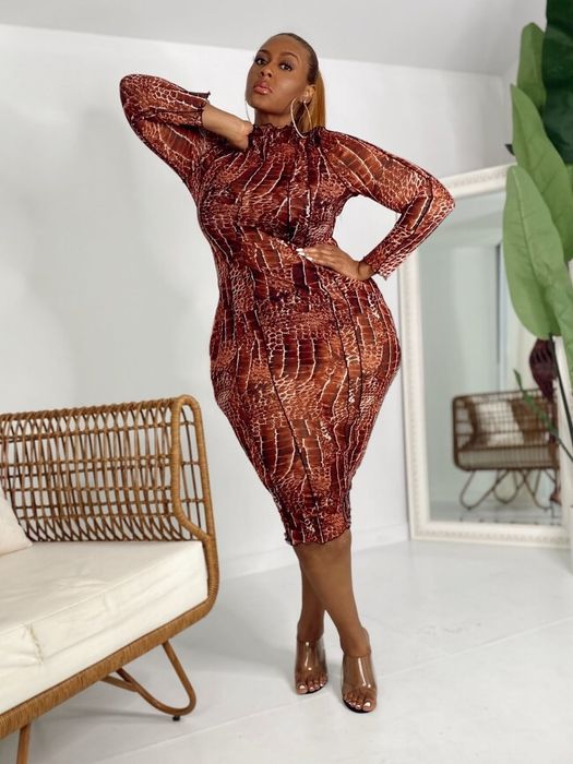a model wearing the mid-length, high-neck brown snakeskin print bodycon dress