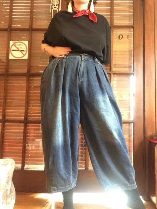 a reviewer wearing the denim bloomers