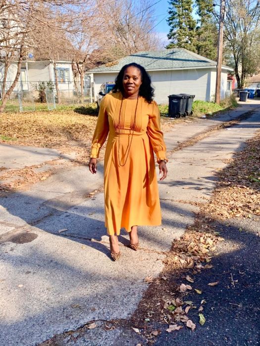 another reviewer showcasing the yellow variation of the dress