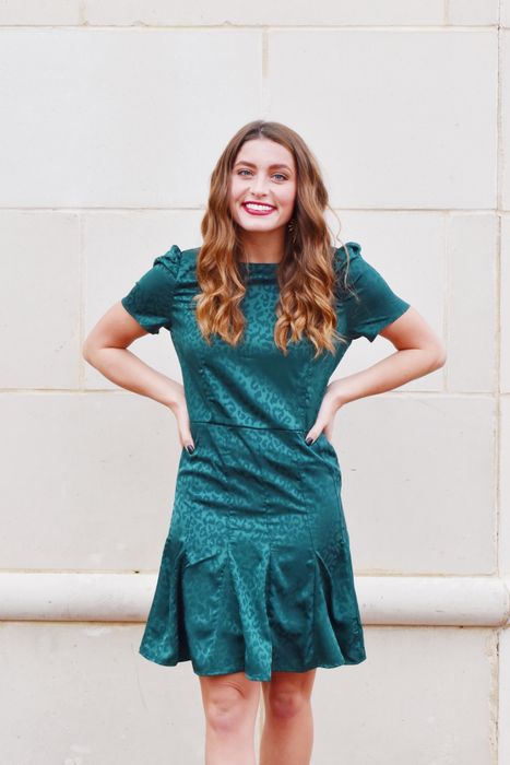 model wearing the teal dress