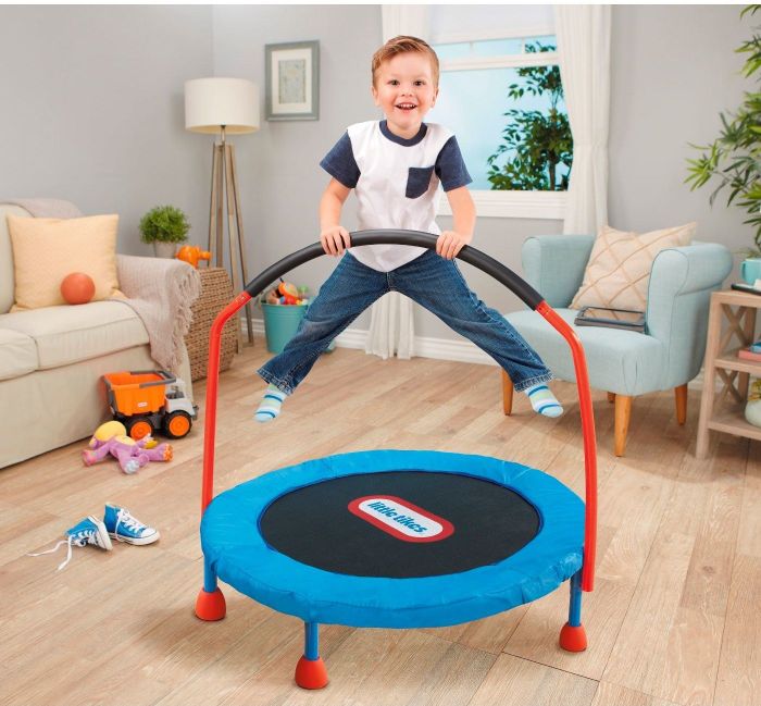 Child jumping on a trampoline