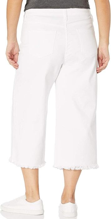 A model showcasing the back view of the product.