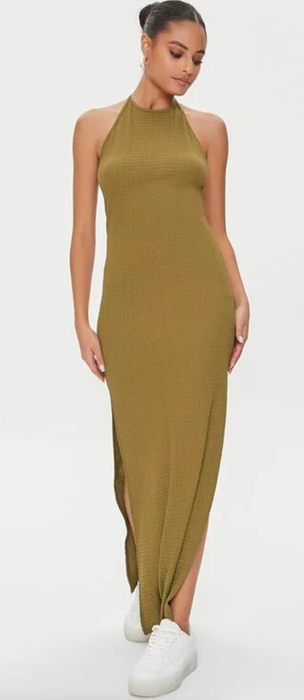 Model showcasing a green dress