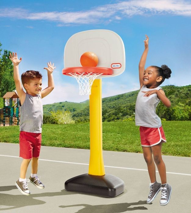 Children playing with a basketball set
