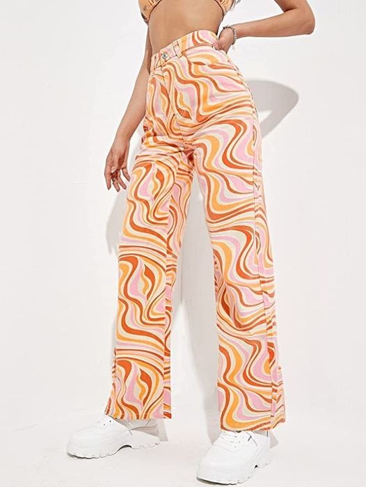 a model showcasing the orange, white, and pink pants