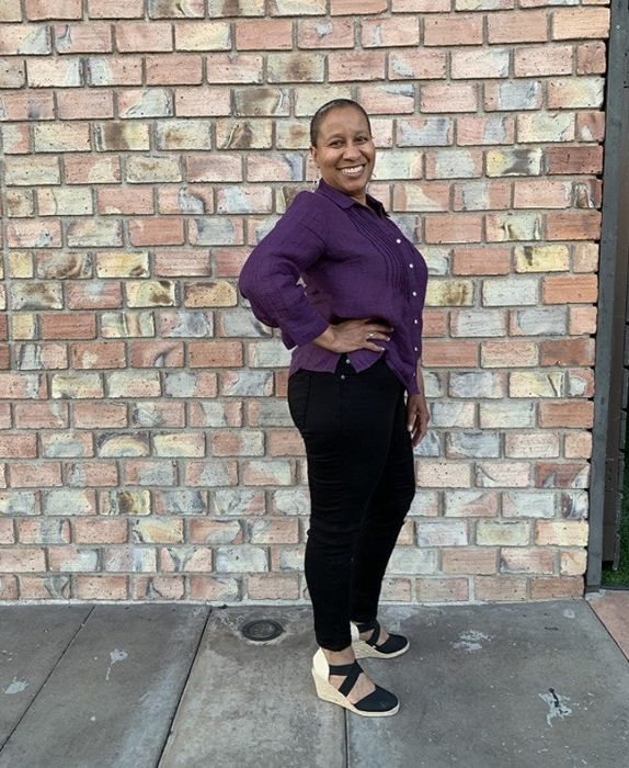 a reviewer modeling the black jeggings