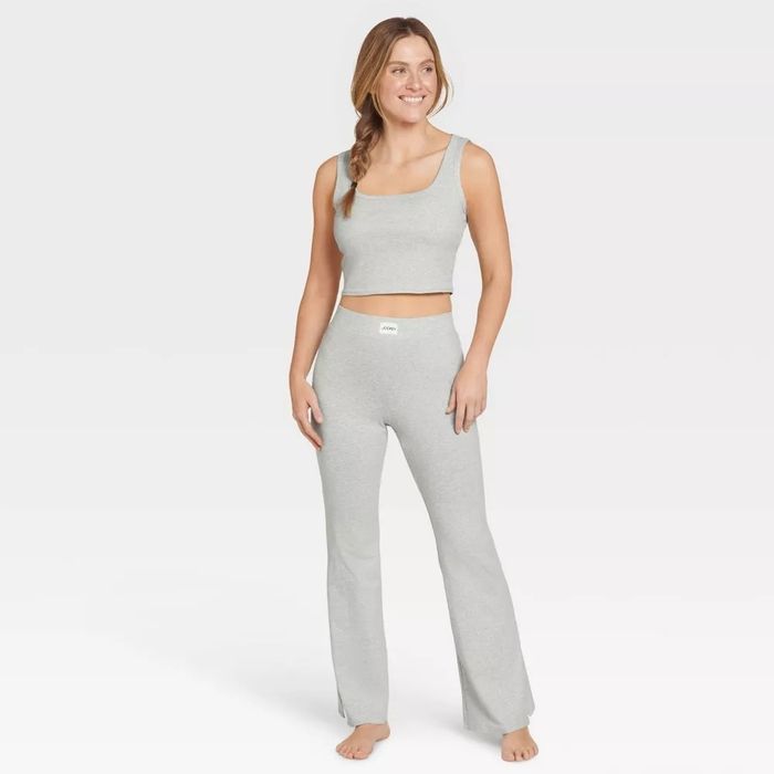 Model showcasing cotton-stretch flare leggings