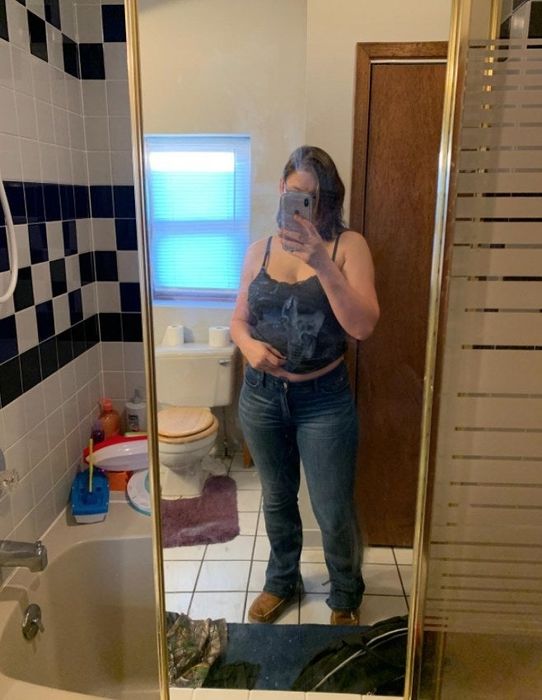 a reviewer modeling the jeans