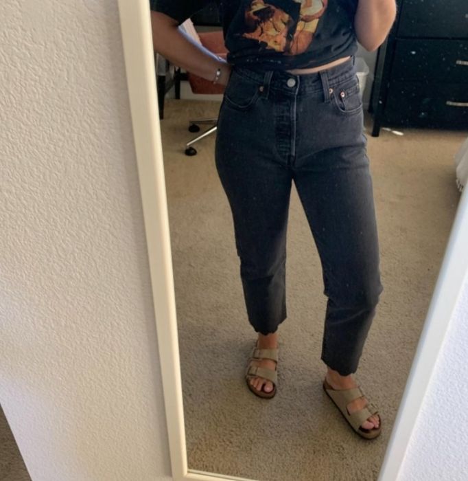 a reviewer wearing the black jeans