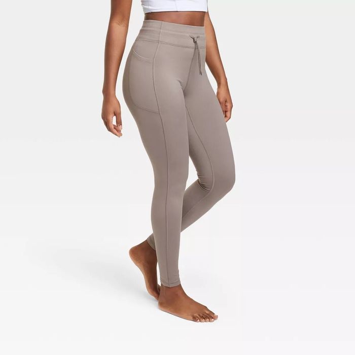 Model showcasing sweat-wicking leggings with pockets