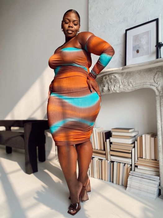 model wearing the brown mini dress