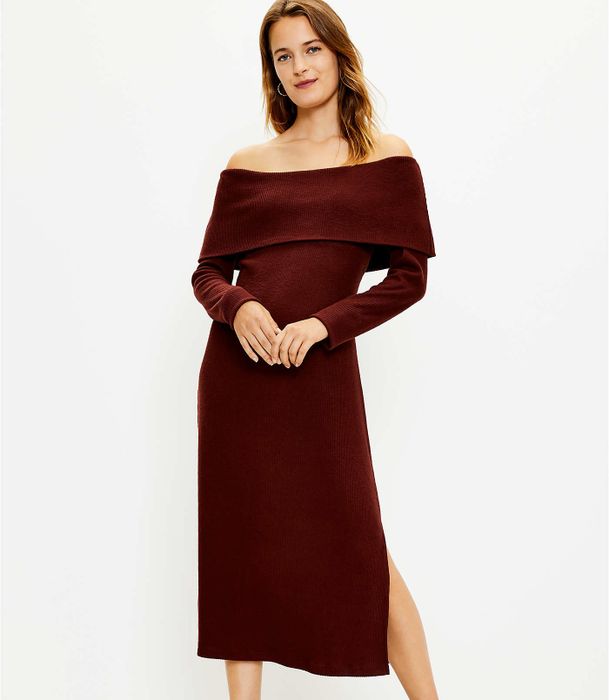 a model wearing the burgundy dress