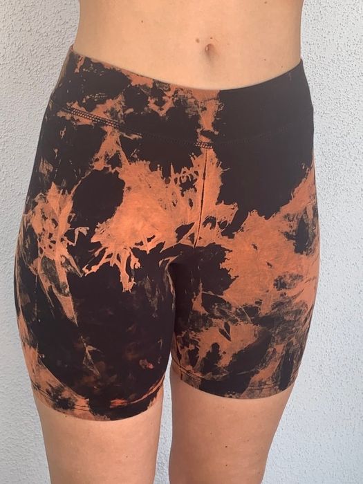 Model wearing the acid wash biker shorts