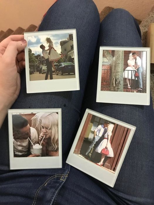 A reviewer's coasters featuring photos framed with white borders to mimic the look of Polaroids