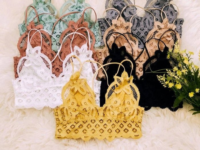 The bralettes come in yellow, white, black, peach, grey, seafoam, and many other shades.