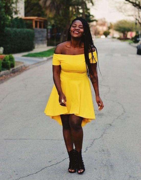 A reviewer showcases the slightly high-low dress in yellow.