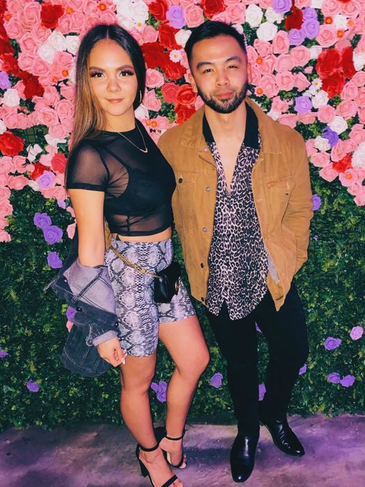 The reviewer styled the shorts with a belt bag, heeled sandals, and a cropped tee.