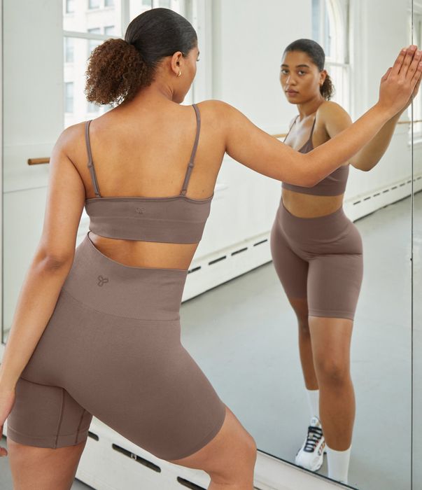 model showcasing taupe biker shorts