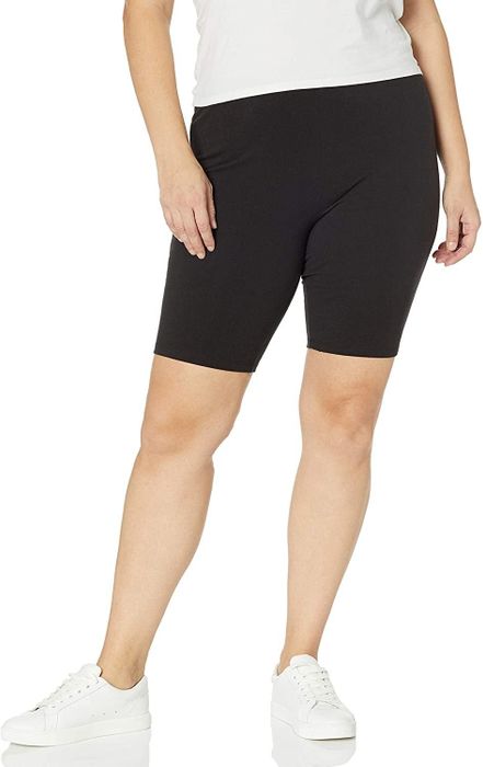 The model is wearing black Just My Size biker shorts.