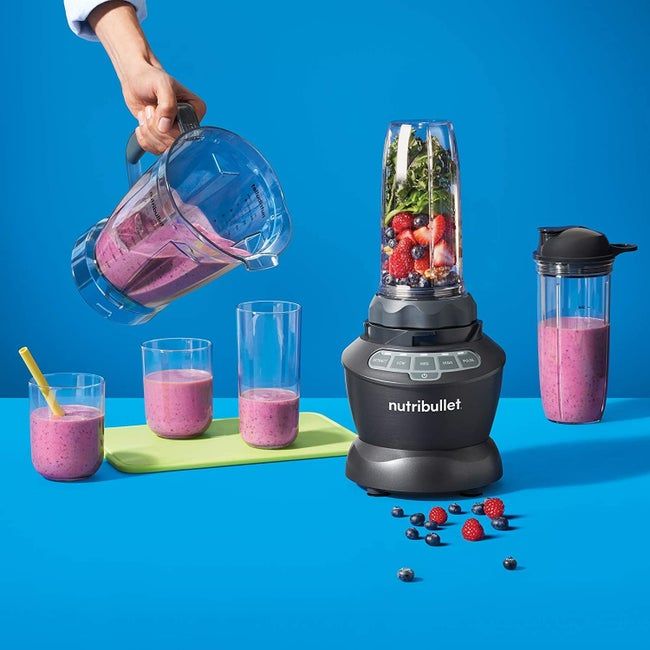 The blender set in action, preparing a smoothie