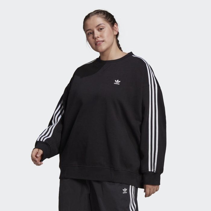 Another model wearing the sweatshirt with sweatpants