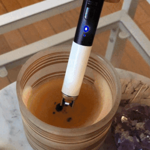 A GIF of a Mytour editor lighting a candle using the electric lighter