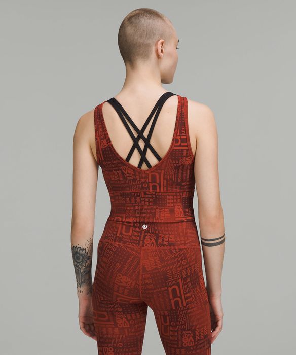 model highlighting the V-neck back of the reversible top