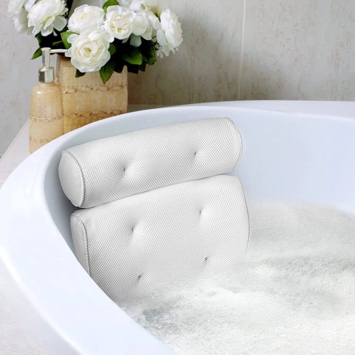 The bath pillow placed in a tub