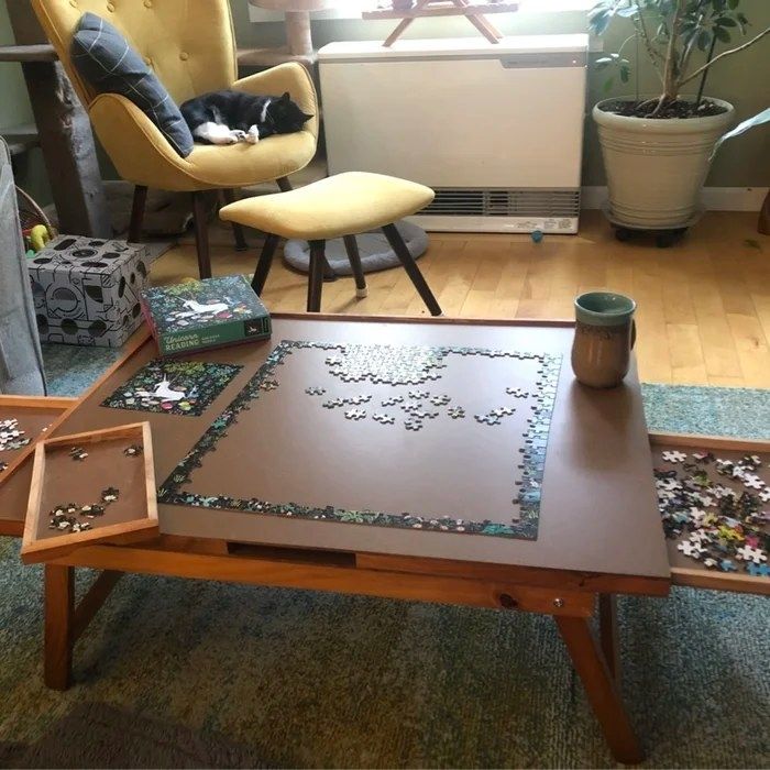 A customer's photo showing the puzzle table in action, ready for a new puzzle challenge.
