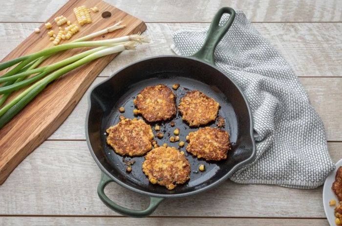 A green cast-iron skillet