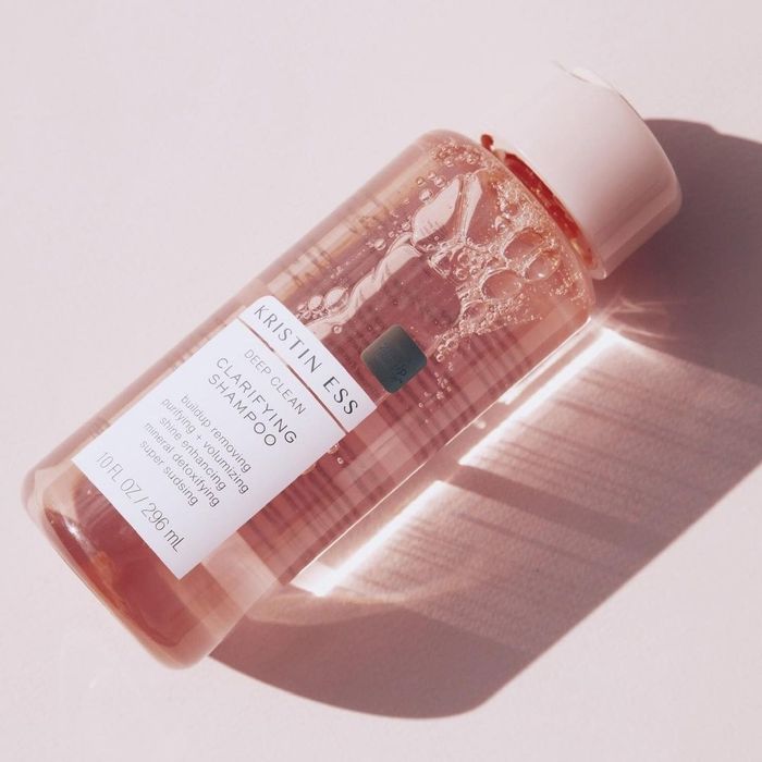 the clear pink bottle of shampoo