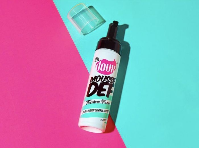 A bottle of hair mousse