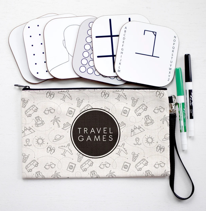 The Travel Games set, featuring dry-erase boards, markers, and a compact carrying case