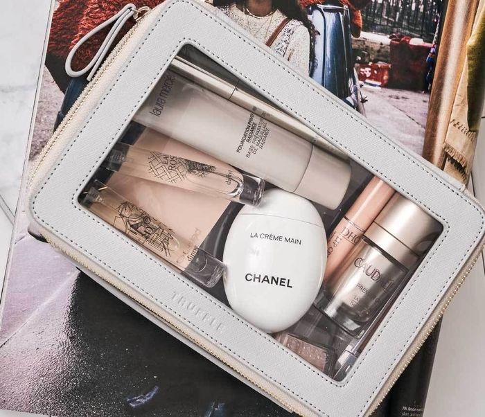 Makeup products neatly stored inside a grey case, keeping everything organized and easy to access.