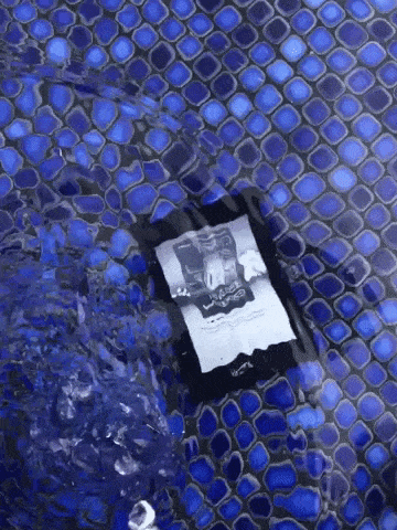 gif of a waterproof Kindle submerged in water