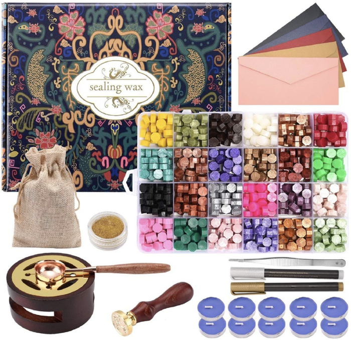 An array of supplies included in the wax seal stamp kit.