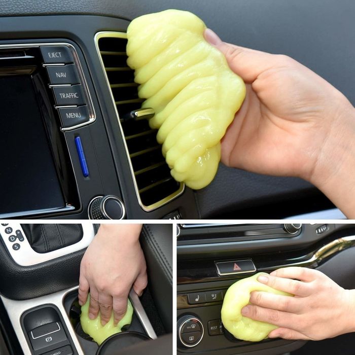 Someone applying the cleaning gel to a car’s interior