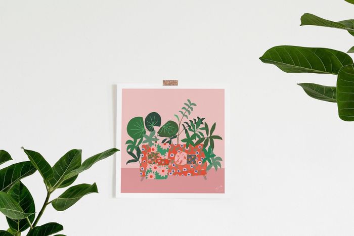 A colorful print featuring a plant still life in shades of pink, red, and green