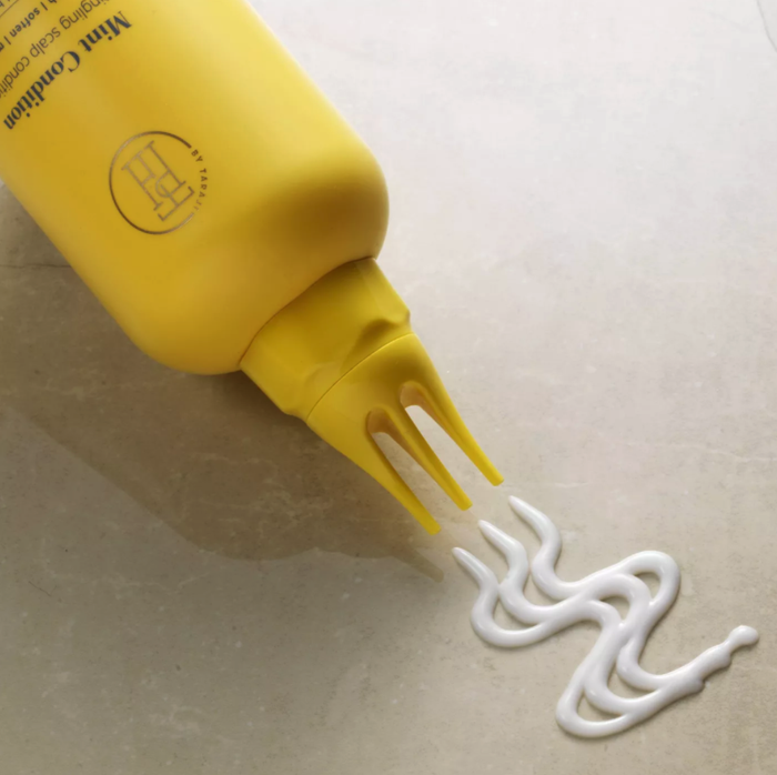 The bottle of scalp conditioner ready to be applied.