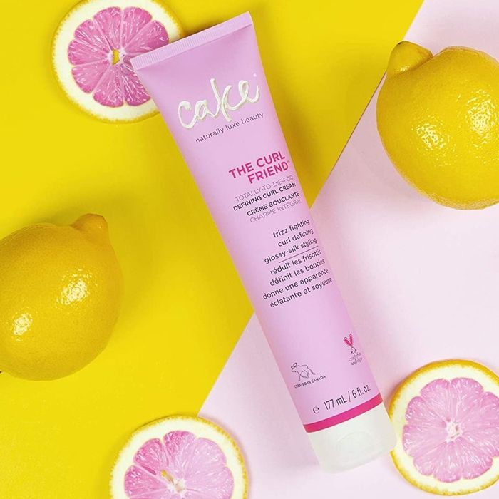 The pink bottle of the defining cream.