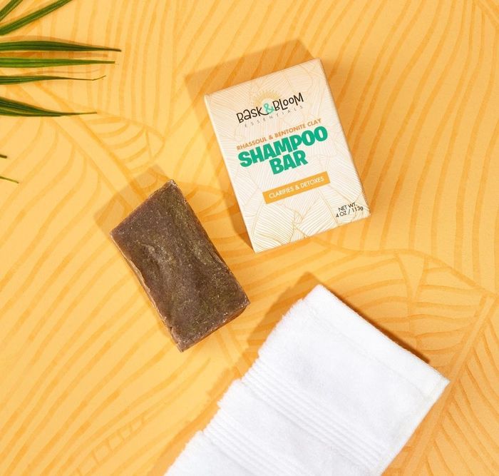 The shampoo bar paired with a towel, a perfect combination for your hair care routine.