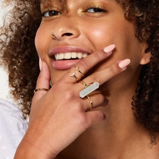 model displaying the moonstone ring collection