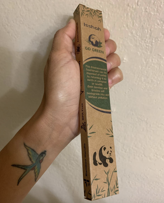 The packaging of the bamboo toothbrush, highlighting its eco-friendly and biodegradable qualities.