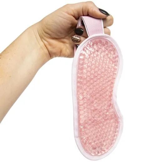 A pink eye mask.