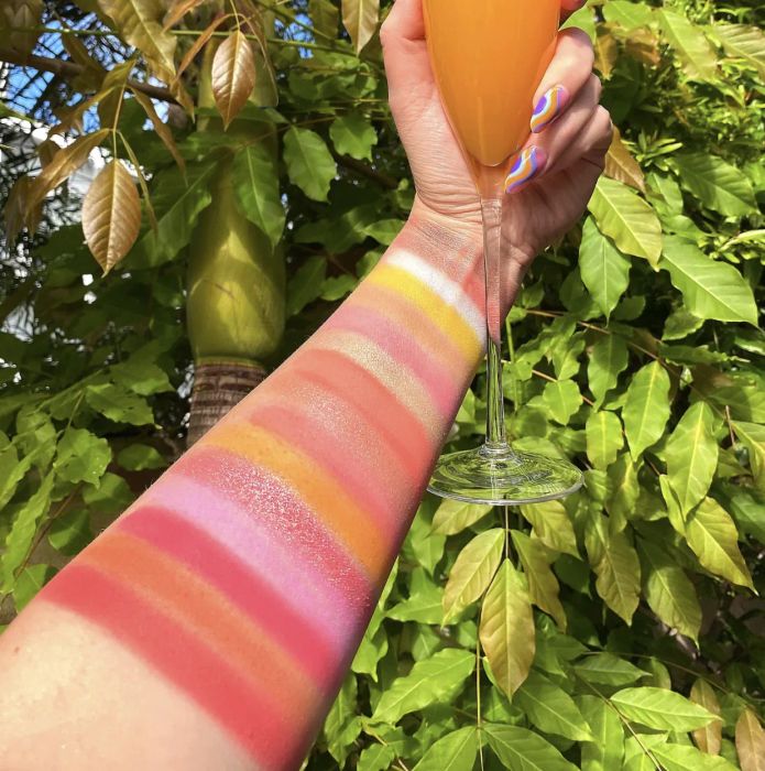 A versatile Mimosa eyeshadow palette, perfect for experimenting with a variety of eye-catching makeup styles.