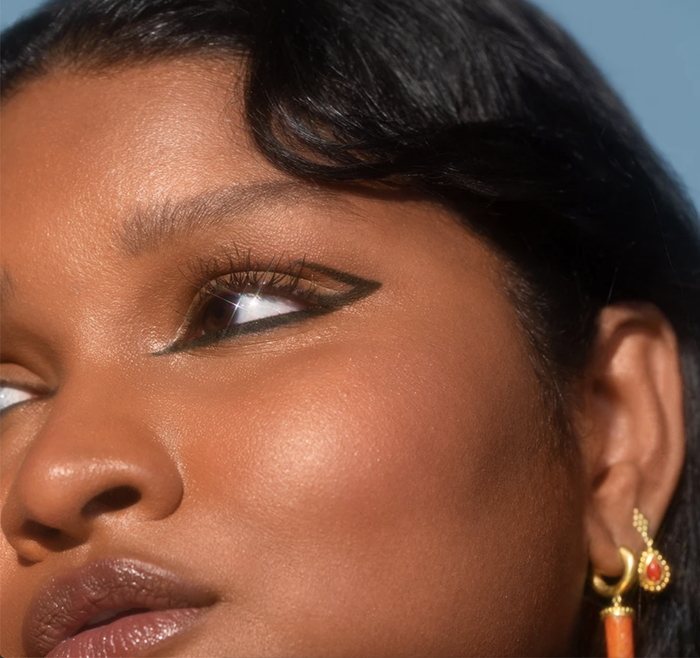 the eyeliner applied in an abstract design