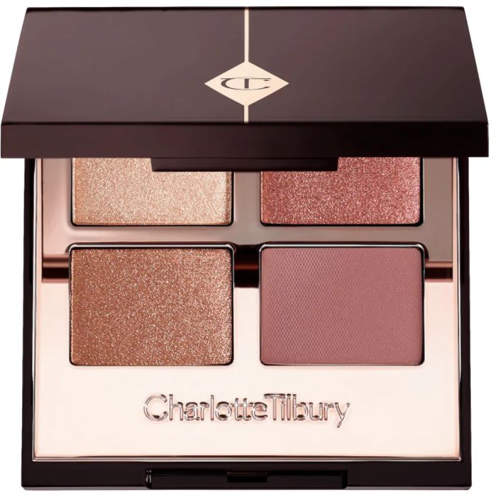 A high-end eyeshadow palette featuring a stunning maroon shade, ideal for creating sophisticated and dramatic eye looks.