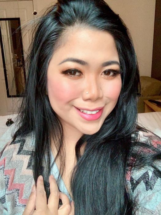 reviewer wearing the blush, which gives her a rosy, natural-looking flush