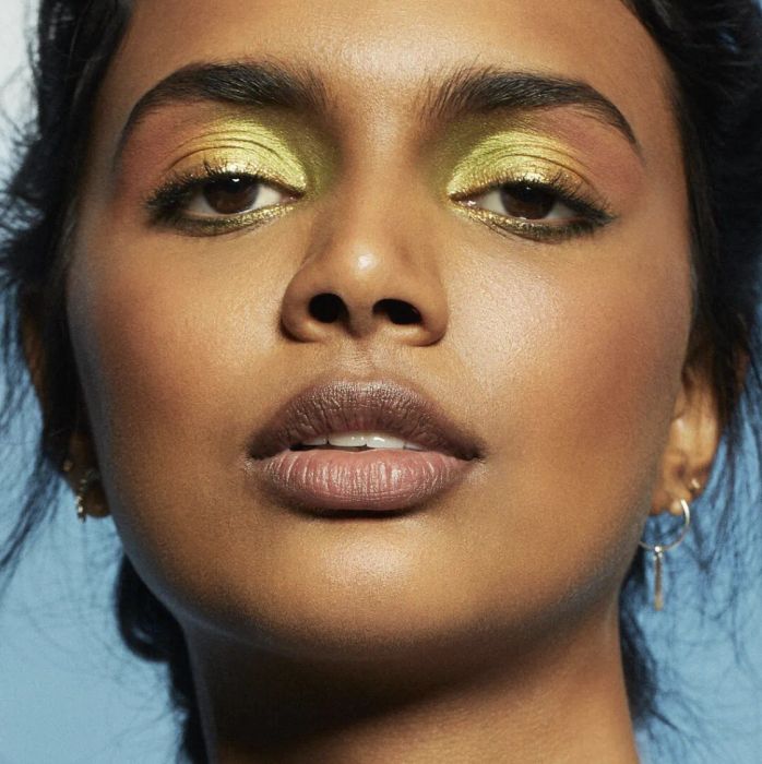 A model showcasing a stunning eye look created using the Hot Jalapeno palette.
